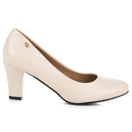 Vices Beige Pumps On A Pillar