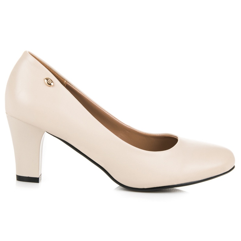 Vices Beige Pumps On A Pillar