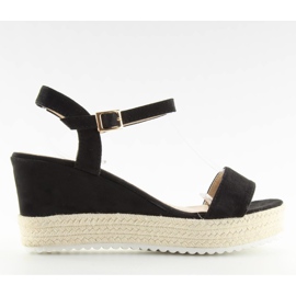 Black sandals on a wedge heel, black espadrilles Black sandals on a wedge heel, black espadrilles