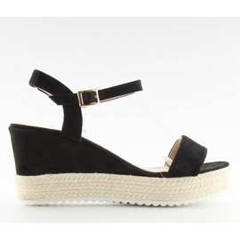 Black sandals on a wedge heel, black espadrilles