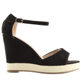 Black sandals on a wedge heel, black espadrilles
