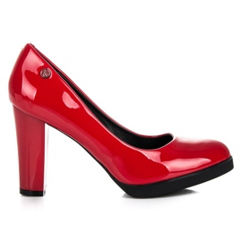 Patent leather pumps on the vices post red