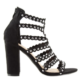 Black high-heeled sandals with black studs