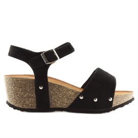 Black sandals on a black cork sole