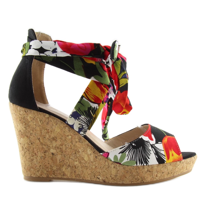 Black sandals on a cork wedge heel