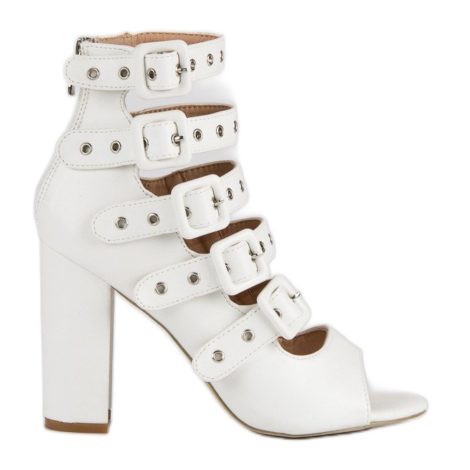 Rock sandals on the vices post white