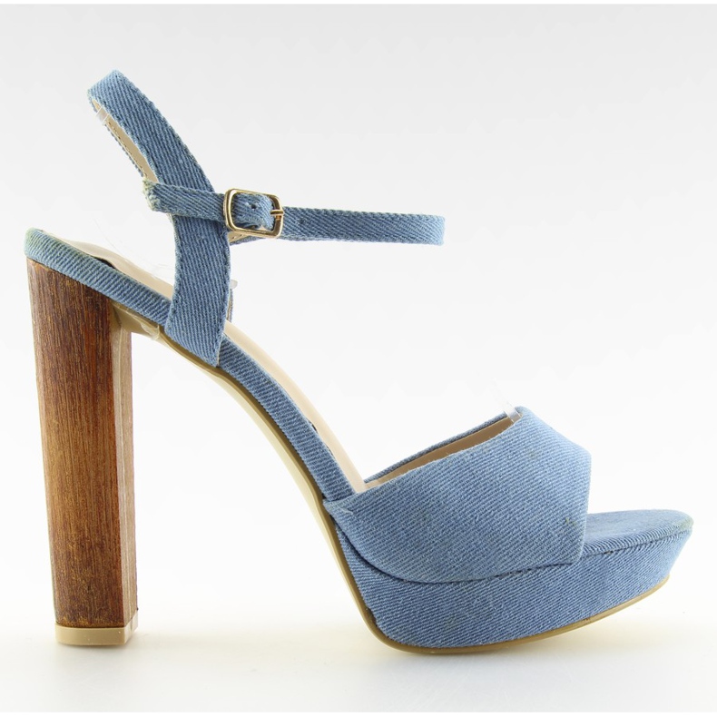 Denim sandals on a blue post 9833