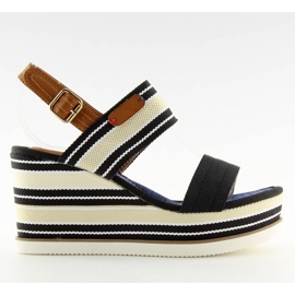 Black sandals on a wedge heel D-37 black