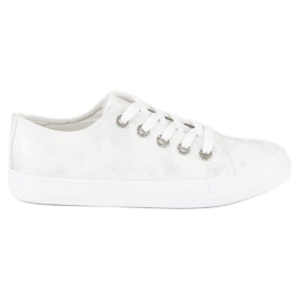 Fashionable sneakers with a binding white