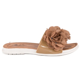 Brown flip-flops with flowers