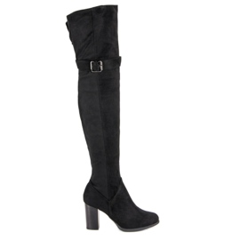 SDS Black thigh boots on the post