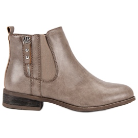 Kayla Beige boots on a flat heel