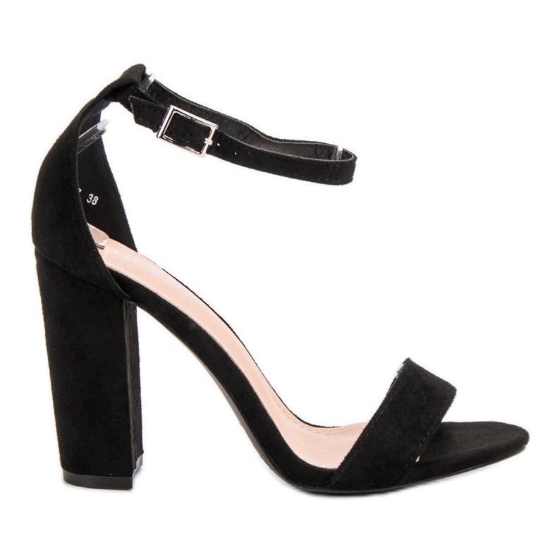 Ch. Creation Black Sandals On A Bar