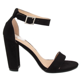 Black sandals on the post. 369-18 Black