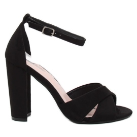 Black sandals on the post. 369-34 Black