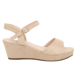 Sandals on a low wedge beige K-7 Beige