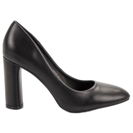 Small Swan Black Pumps On A Pillar