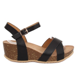 Black sandals on a wedge heel 1058 Black