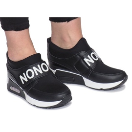 Black sports sneakers on the Monon wedge Black sports sneakers on the Monon wedge