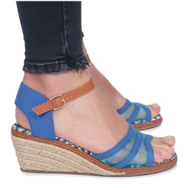 Blue sandals on the Monro low wedge heel