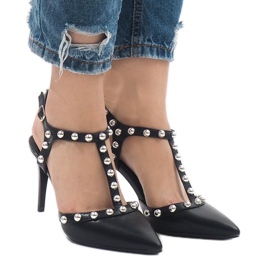 Black lacquered heels with B-57 studs Black lacquered heels with B-57 studs
