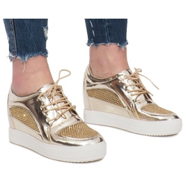 Adele's Gold Lacquered Openwork Sneakers golden