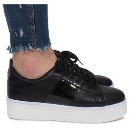Black Sneakers On The Livet De Lux Platform