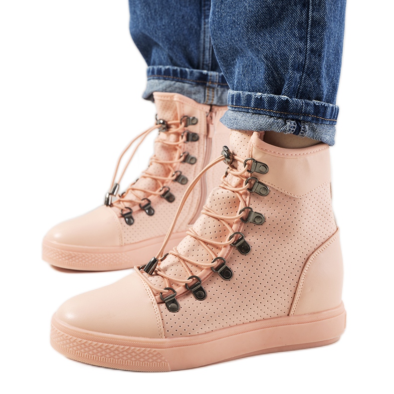 Pink openwork sneakers on the Mathilde wedge