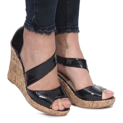Black patent sandals on the cork wedge Lie