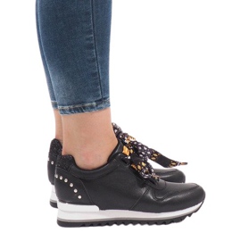 Black sports sneakers on the wedge G-124