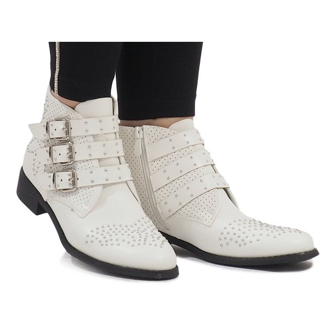 White boots with HQ909 studs