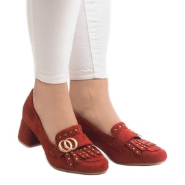 Red suede pumps on the X77 pillar