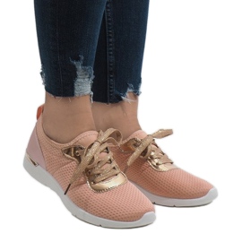 T511 pink trainers