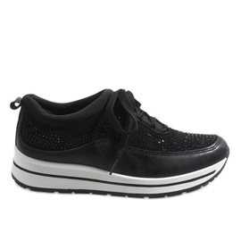 Black sports sneakers on the F-2831 platform