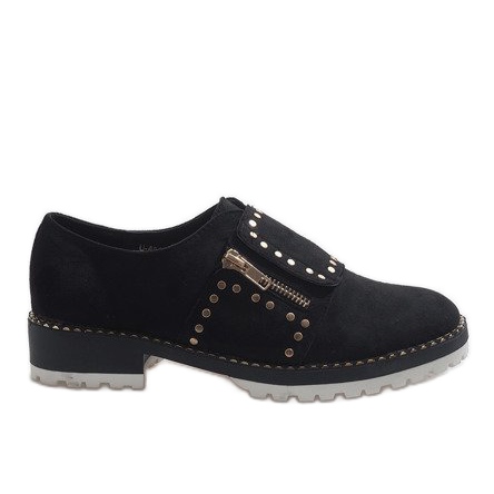 Black slip-on shoes with U-6249 studs