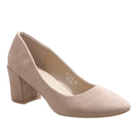 Beige suede pumps on the D-1228 pillar