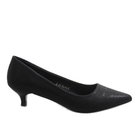 Black pumps on a B-36 heel