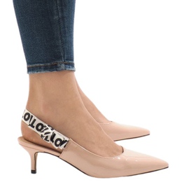 Pink pumps on a HD-28 heel