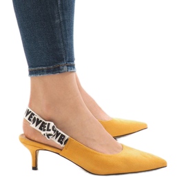 Yellow pumps on a HD-33 heel