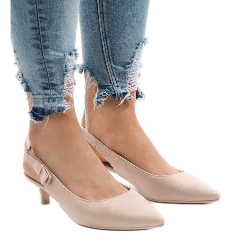 Beige pumps on a B-43 heel