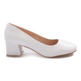 White pumps on the Renda post brown