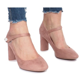 Pink pumps on the Milaya post
