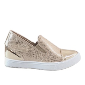 Golden sneakers on the wedge DD437-8
