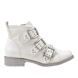 White openwork boots with a NC171 buckle
