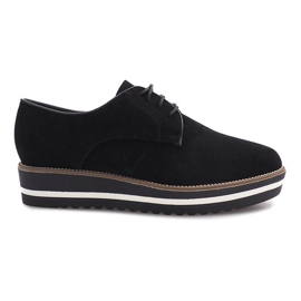 Black lace-up shoes from Paulette