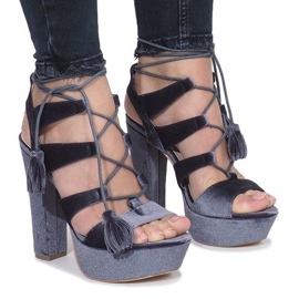 Gray sandals on a One Love velor post grey