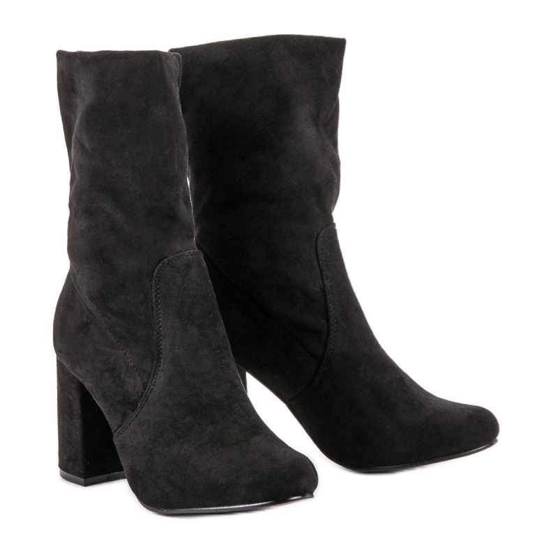 Super Mode Slip-on boots on a post black