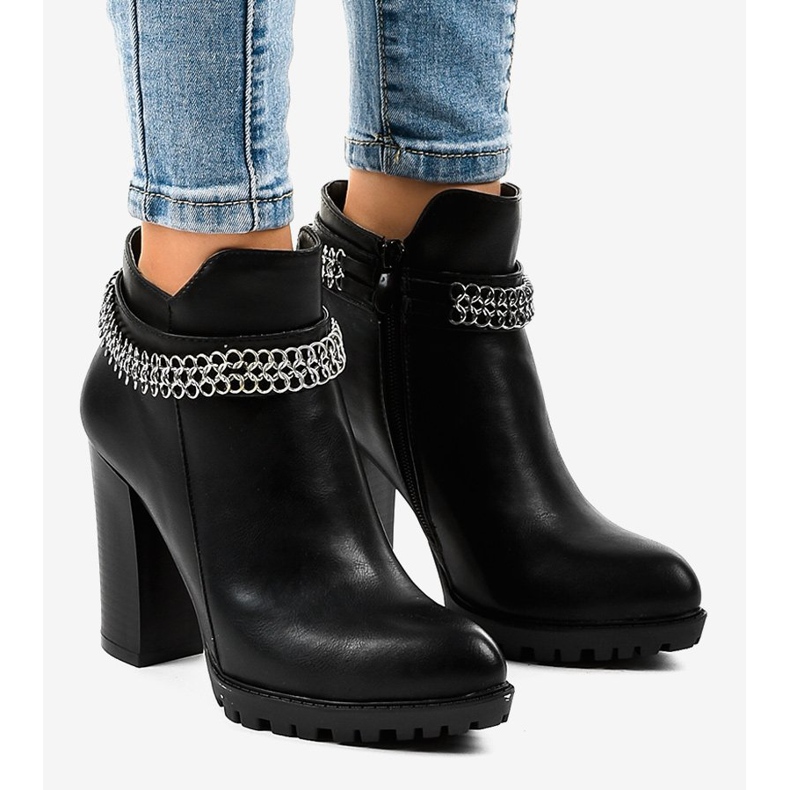 Black boots on the post with a chain 13X992-51A