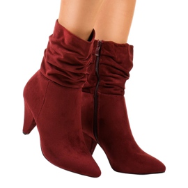 Maroon suede boots on the F027 post red