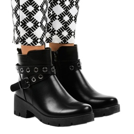 Black flat-heeled ankle boots with a 9996-2 buckle